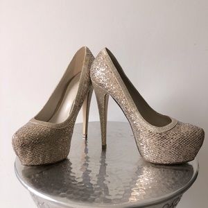 Aldo Women’s pumps size 6.5 platform stiletto high heels gold